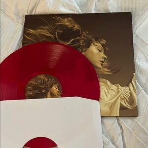 Red Vinyl Record with Album Cover
